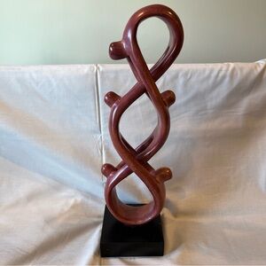 Abstract sculpture, modern art strength, unity figures, Infinity symbol decor